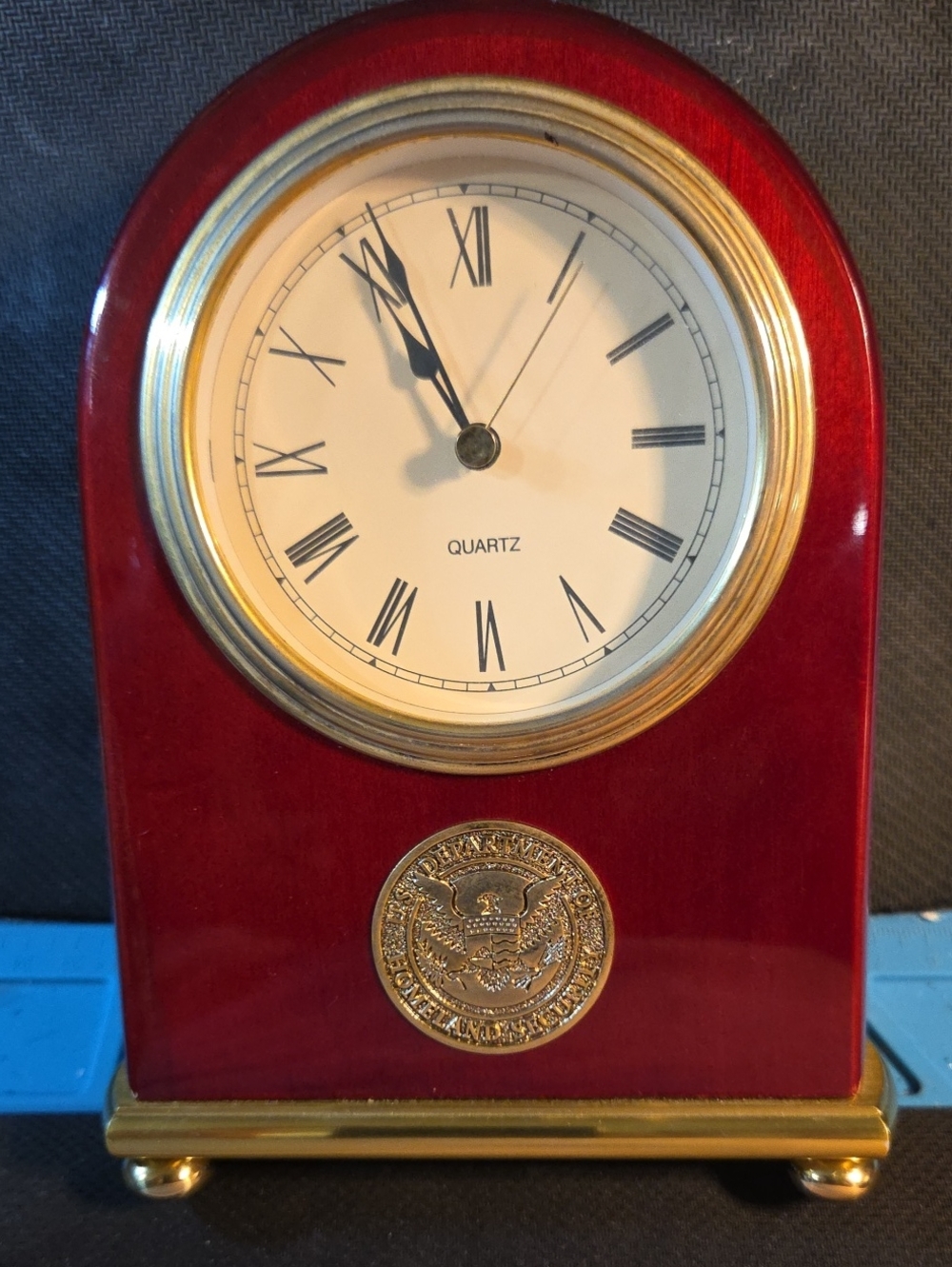 Classic Red Mantel Clock with Gold Accents